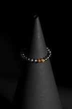 Bracelet | Single Strand | Round Beads | Metallic Hematite Beads with Tiger's Eye Accent Beads | Men & Women | Beaded Design | Polished & Metallic Finish | Minimalist Style