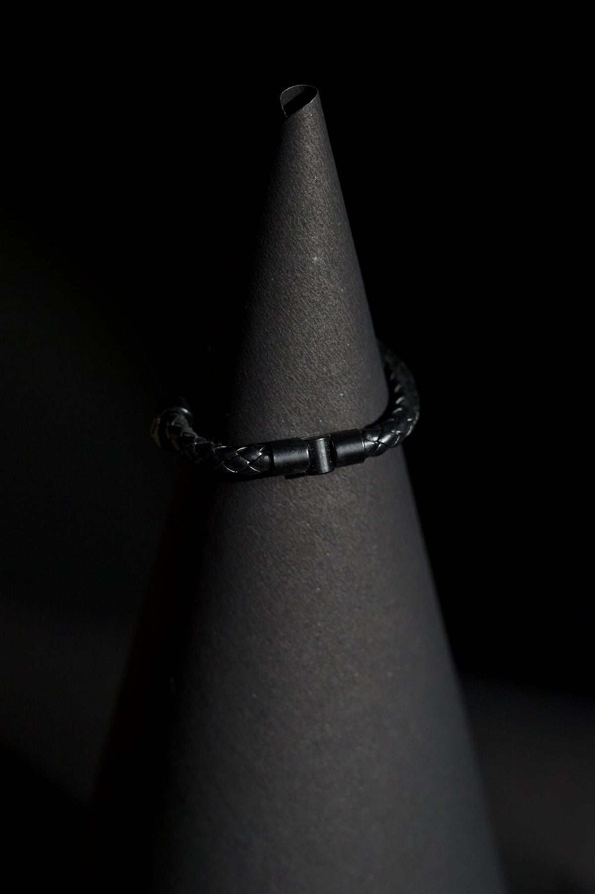 Bracelet | Single Strand | Woven Braided Cord | Black Braided Leather-Look Cord with Dual Black Skull Clasp-Accent | Men & Women | Braided Design | Matte Black Finish | Gothic & Edgy Style